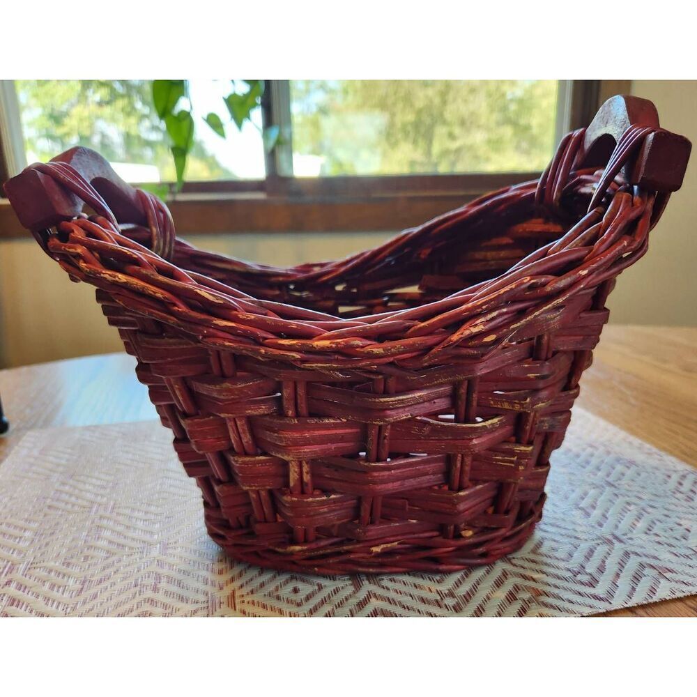 Red basket with wood handles